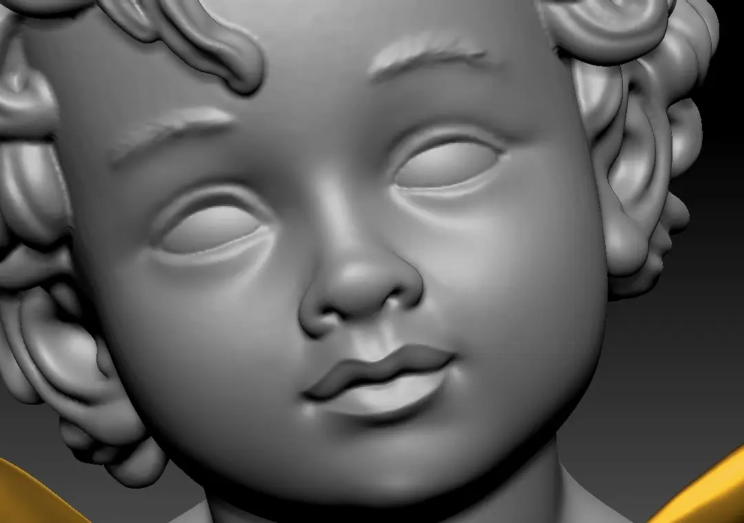 La cara del cupido esculpida en 3D, en gris, con los rizos y los mofletes
