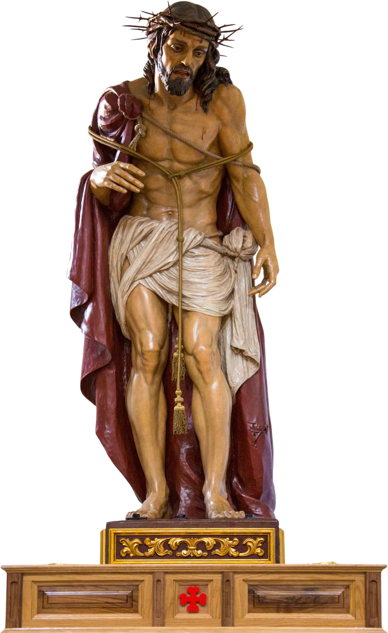 Imagen de Cristo atado, con corona de espinas y manto granate, de pie sobre su peana dorada
