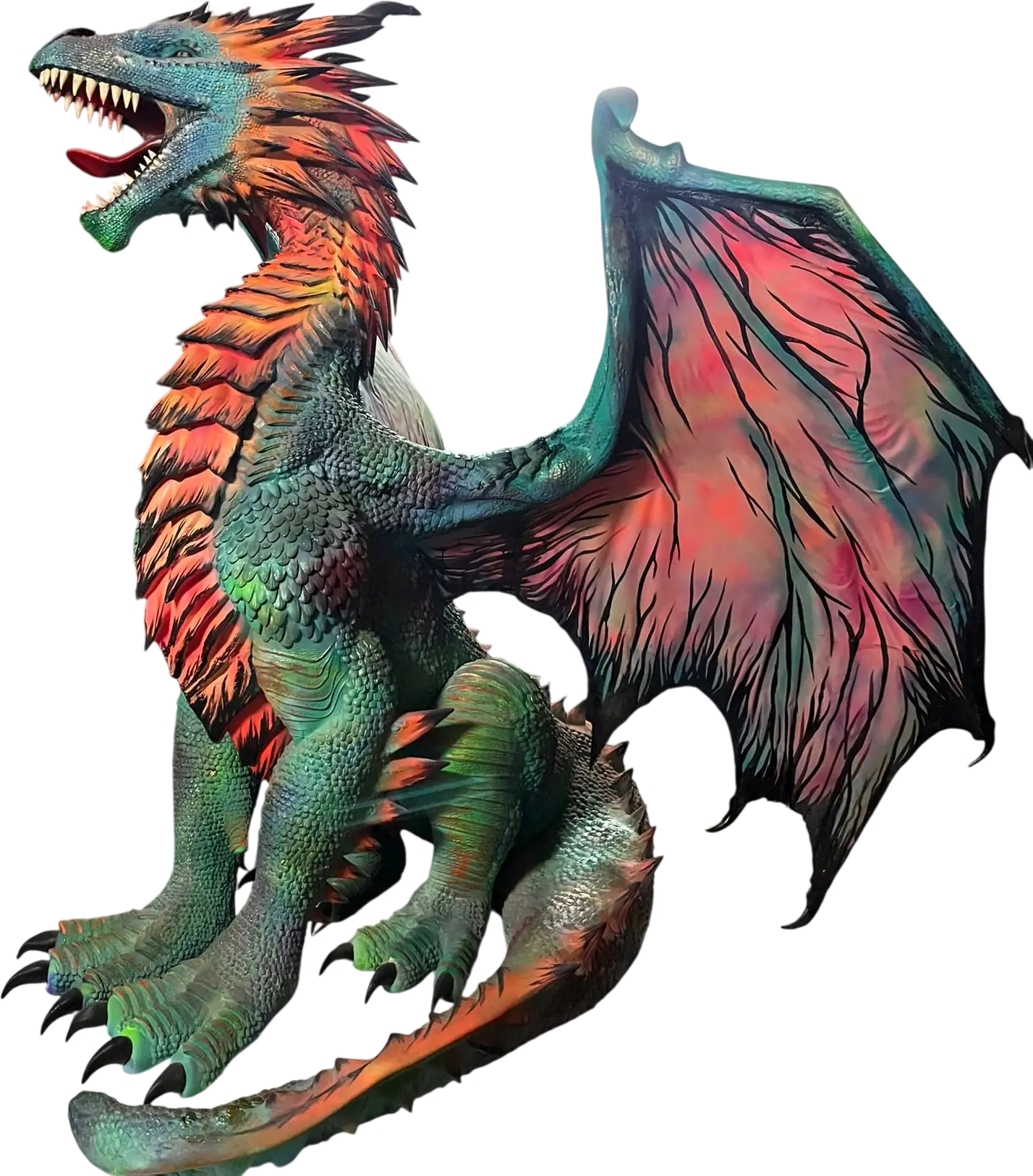 Dragón de poliespán con las alas abiertas para una carroza, pintado en verde, naranja y rojo